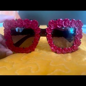 Black Dolce & Gabbana sunglasses with red roses.